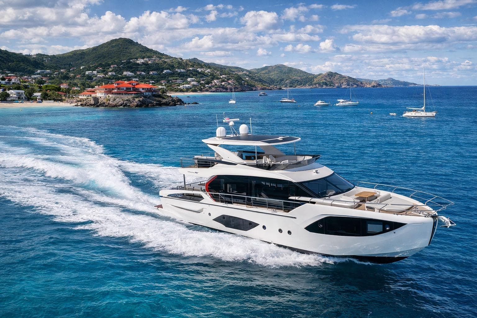 Sleek motor yacht moored in clear water